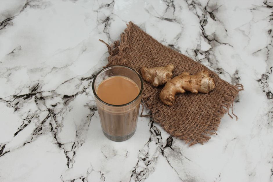 Glass of traditional masala karak chai